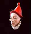 Pinocchio con cappello rosso